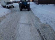 Ульяновские дорожники очищают тротуары и улицы частного сектора