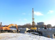 Опоры будущего моста в створе улиц Шевченко и Смычки готовы на 65%